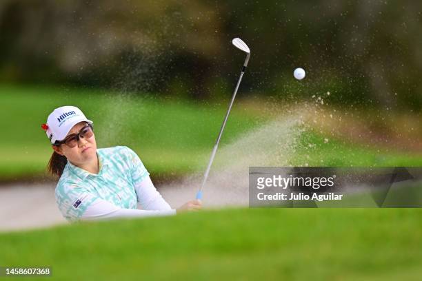 Nasa Hataoka of Japan plays a shot from a bunker on the eighth hole during the final round of the Hilton Grand Vacations Tournament of Champions at...