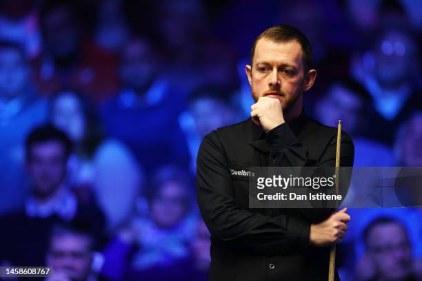 Mark Allen of Northern Ireland prepares to play a shot during the 2023 World Grand Prix final match against Judd Trump of England at Centaur Arena on...