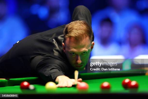 Judd Trump of England plays a shot during the 2023 World Grand Prix final match against Mark Allen of Northern Ireland at Centaur Arena on January...