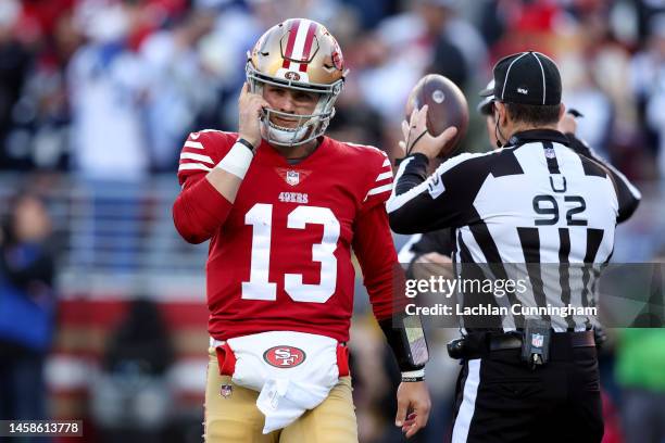 Brock Purdy of the San Francisco 49ers reacts during the first half of the game against the Dallas Cowboys in the NFC Divisional Playoff game at...