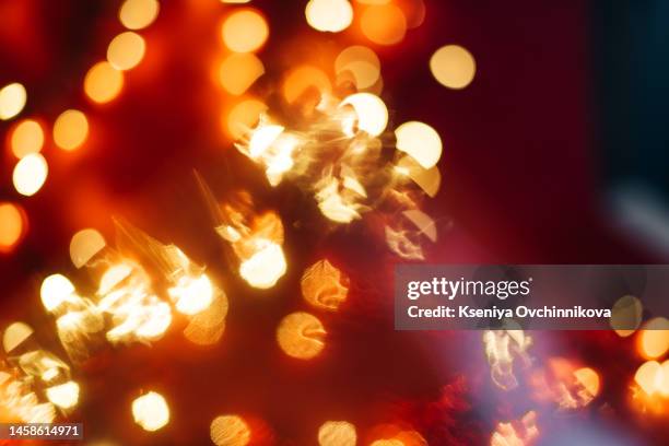 soft defocused holidays light background - bling bling stock-fotos und bilder