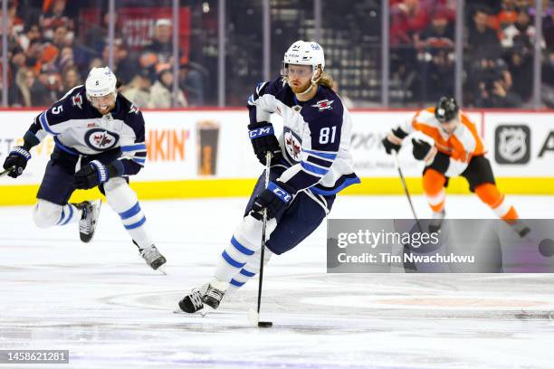 Kyle Connor of the Winnipeg Jets skates with the puck during the first period against the Philadelphia Flyers at Wells Fargo Center on January 22,...