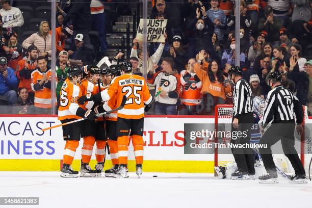 The Philadelphia Flyers celebrate following a goal by Ivan Provorov during the first period against the Winnipeg Jets at Wells Fargo Center on...