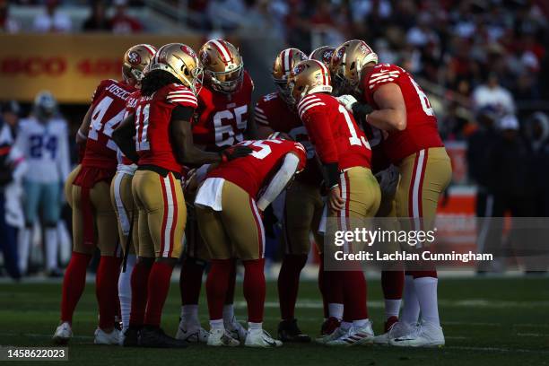 The San Francisco 49ers offense huddles during the first half of the game against the Dallas Cowboys in the NFC Divisional Playoff game at Levi's...