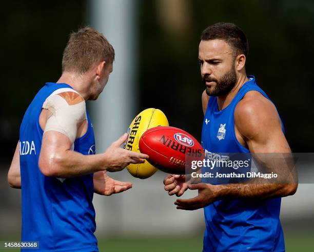 Griffin Logue and Jack Ziebell of the Kangaroos in action during a North Melbourne Kangaroos AFL training session at Arden Street Ground on January...