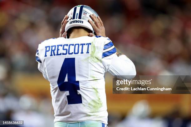 Dak Prescott of the Dallas Cowboys reacts during the second half of the game against the San Francisco 49ers in the NFC Divisional Playoff game at...