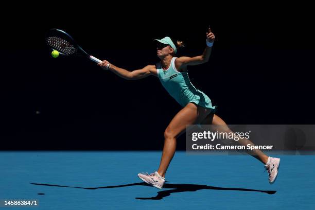 Magda Linette of Poland plays a forehand in the fourth round singles match against Caroline Garcia of France during day eight of the 2023 Australian...