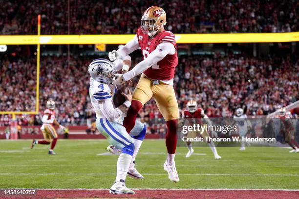 Arik Armstead of the San Francisco 49ers pressures Dak Prescott of the Dallas Cowboys during the fourth quarter of the game in the NFC Divisional...