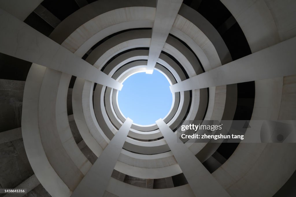 Low angle view of spiral roadway in a parking garage