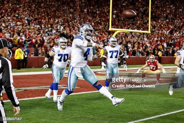 Dak Prescott of the Dallas Cowboys passes on the run during an NFL divisional round playoff football game between the San Francisco 49ers and the...