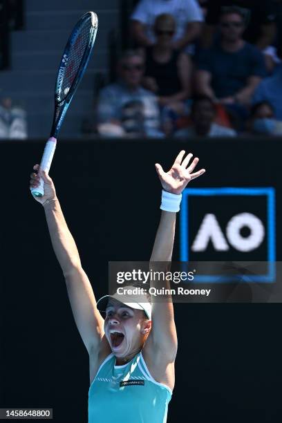 Magda Linette of Poland celebrates winning match point in the fourth round singles match against Caroline Garcia of France during day eight of the...