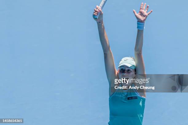 Magda Linette of Poland celebrates winning match point in the fourth round singles match against Caroline Garcia of France during day eight of the...
