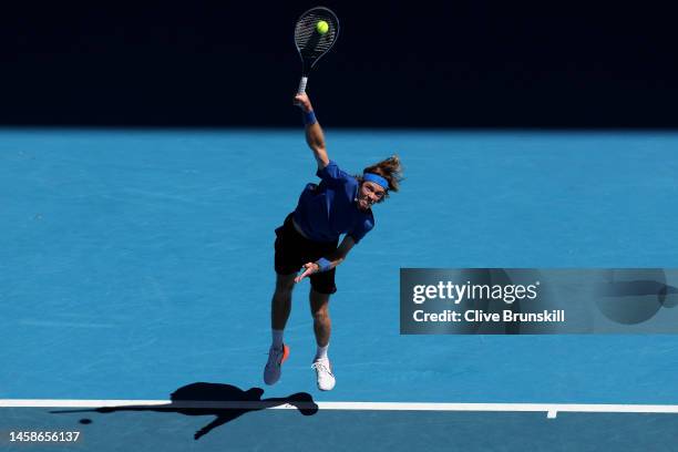 Andrey Rublev of Russia serves in the fourth round singles match against Holger Rune of Denmark during day eight of the 2023 Australian Open at...