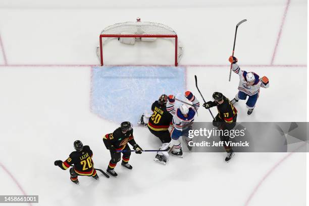 Zach Hyman of the Edmonton Oilers celebrates after scoring on Spencer Martin of the Vancouver Canucks during their NHL game at Rogers Arena January...