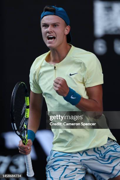 Holger Rune of Denmark celebrates in the fourth round singles match against Andrey Rublev of Russia during day eight of the 2023 Australian Open at...