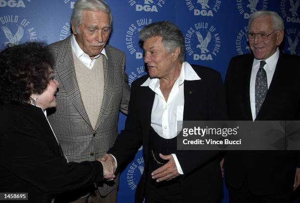 Actors Kathryn Grayson, Howard Keel, Tony Curtis and Dr. Robert Schuller attend a tribute to the career of the late director George Sidney on October...