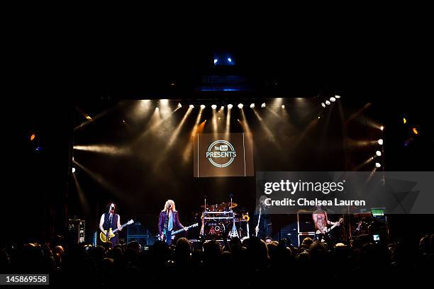 Guitarist Vivian Campbell, bassist Rick Savage, drummer Rick Allen, vocalist Joe Elliott and guitarist Phil Collen of Def Leppard perform at House of...