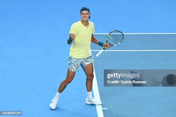 Holger Rune of Denmark celebrates in the fourth round singles match against Andrey Rublev of Russia during day eight of the 2023 Australian Open at...