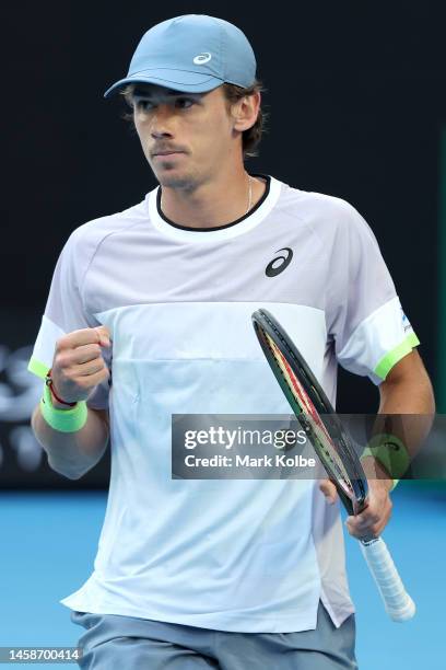 Alex de Minaur of Australia reacts during the fourth round singles match against Novak Djokovic of Serbia during day eight of the 2023 Australian...