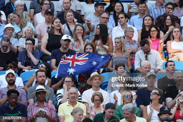 Fans show their support during the fourth round singles match between Alex de Minaur of Australia and Novak Djokovic of Serbia on Rod Laver Arena...