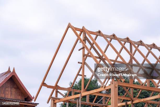 roof wood truss system beams of the house,tile,construction of houses. - roof truss stock pictures, royalty-free photos & images