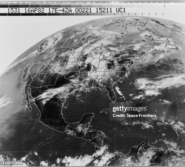 Meteorological satellite view of the Earth showing North America and Central America, with the Pacific Ocean to the east and the Atlantic Ocean to...