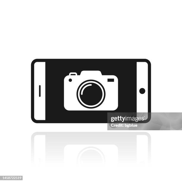 smartphone with camera. icon with reflection on white background - camera screen white background stock illustrations