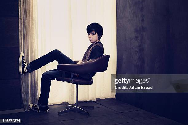 Actor Asa Butterfield is photographed for InStyle magazine on December 15, 2011 in London, England.
