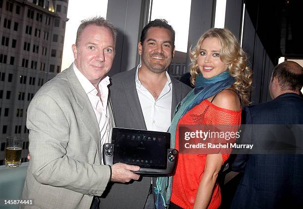 WikiPad President of Sales, Fraser Townley, Founder of Seven Artist Management, Tim Ranson and actress Estella Warren attend the VIP red carpet...