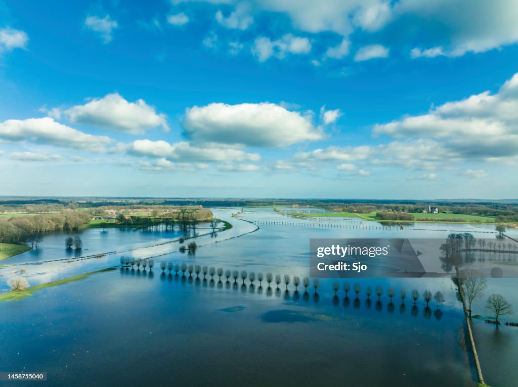 Vecht river high water level flooding at the Vilsteren weir drone view