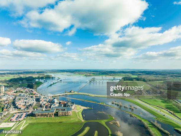 vecht river high water level flooding at the vilsteren weir drone view - the valley stockfoto's en -beelden