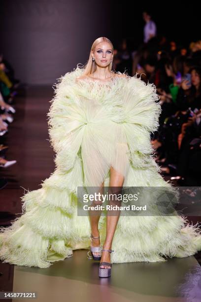 Model walks the runway during the Georges Hobeika Haute Couture Spring Summer 2023 show at Palais de Chaillot as part of Paris Fashion Week on...