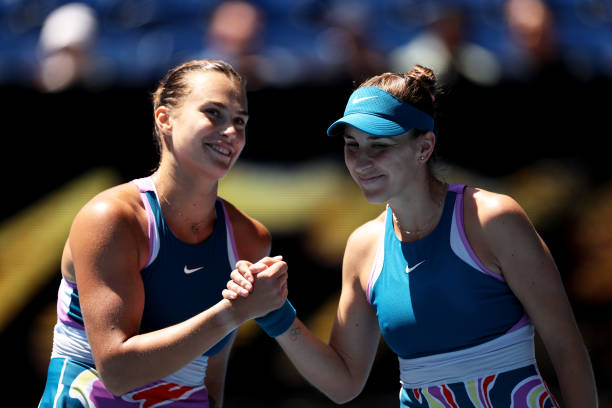 Aryna Sabalenka of Belarus shakes hands at the net after winning in the fourth round singles match against Belinda Bencic of Switzerland during day...