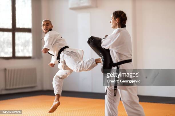 para-taekwondo - sparring foto e immagini stock