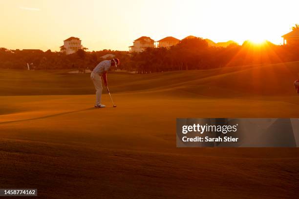 Brett Drewitt of Australia putts on the first green during the second round of The Bahamas Great Abaco Classic at The Abaco Club on Winding Bay on...