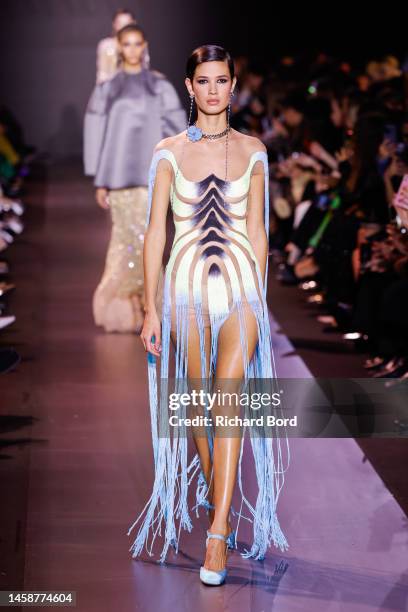 Model walks the runway during the Georges Hobeika Haute Couture Spring Summer 2023 show at Palais de Chaillot as part of Paris Fashion Week on...