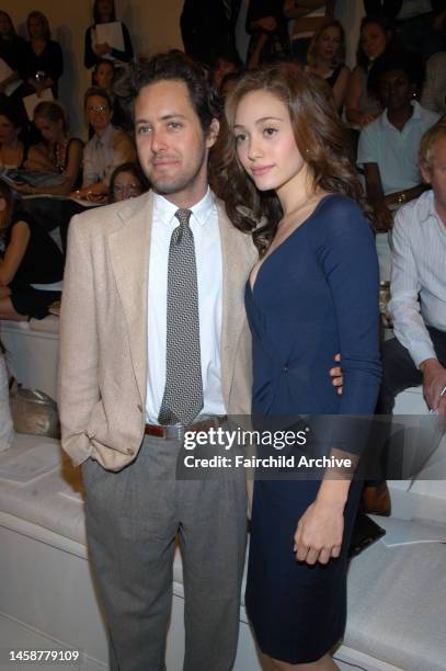 David Lauren and actress Emmy Rossum front row at Ralph Lauren's spring 2005 show in New York.