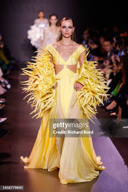 Model walks the runway during the Georges Hobeika Haute Couture Spring Summer 2023 show at Palais de Chaillot as part of Paris Fashion Week on...