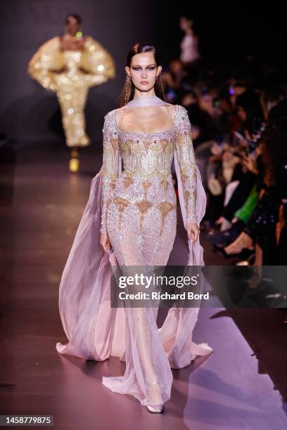 Model walks the runway during the Georges Hobeika Haute Couture Spring Summer 2023 show at Palais de Chaillot as part of Paris Fashion Week on...