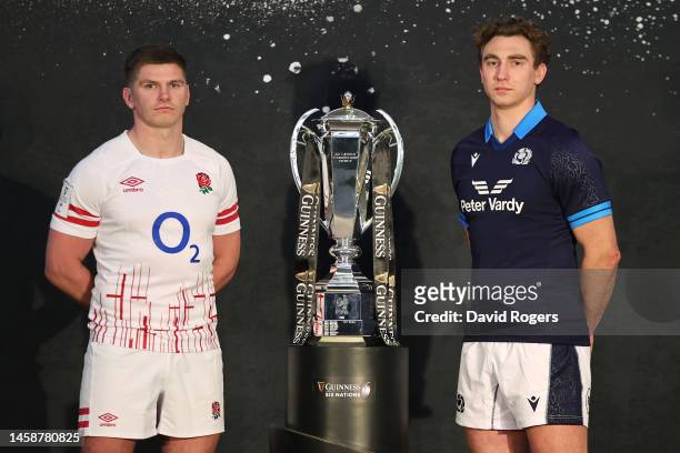Owen Farrell, Captain of England and Jamie Ritchie, Captain of Scotland pose alongside the Guinness Six Nations trophy during the 2023 Guinness Six...