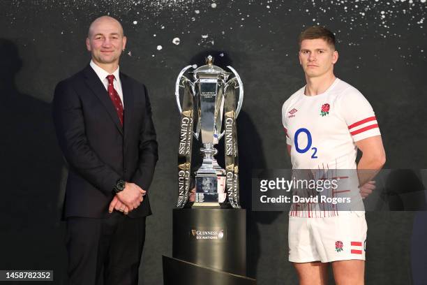 Steve Borthwick, Head Coach of England and Owen Farrell, Captain of England pose alongside the Guinness Six Nations trophy during the 2023 Guinness...