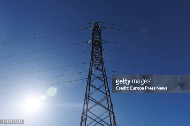 View of a high voltage tower, on 23 January, 2023 in San Sebastian de los Reyes, Madrid, Spain. The average price of electricity for regulated tariff...
