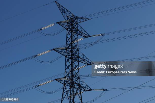 View of a high voltage tower, on 23 January, 2023 in San Sebastian de los Reyes, Madrid, Spain. The average price of electricity for regulated tariff...