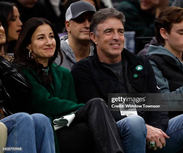 Boston Celtics majority owner Wyc Grousbeck looks on with his wife, Emilia Fazzalari, left, during the second half of the game between the Boston...