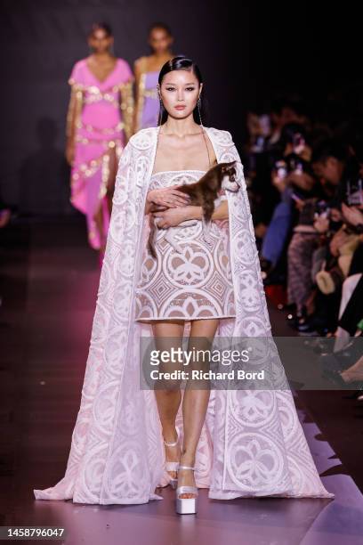 Model walks the runway during the Georges Hobeika Haute Couture Spring Summer 2023 show at Palais de Chaillot as part of Paris Fashion Week on...