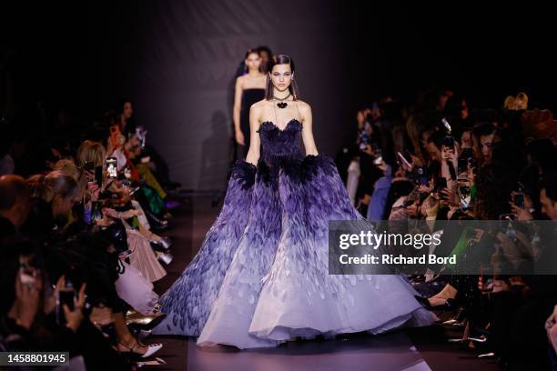 Model walks the runway during the Georges Hobeika Haute Couture Spring Summer 2023 show at Palais de Chaillot as part of Paris Fashion Week on...