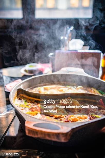 hot pot with lots of steam - szechuan cuisine ストックフォトと画像