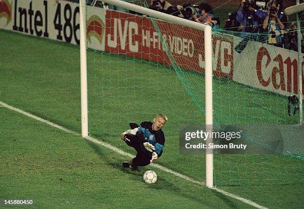 Peter Schmeichel of Denmark saves the penalty kick in the shoot-out to send Denmark into the final during the UEFA European Championships 1992...