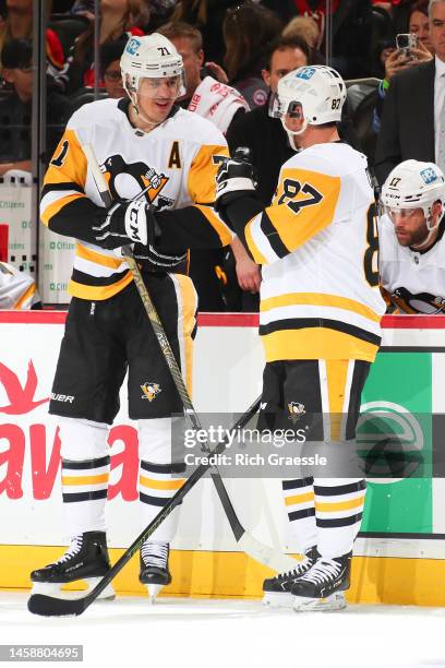 Sidney Crosby of the Pittsburgh Penguins and Evgeni Malkin of the Pittsburgh Penguins during the game against the New Jersey Devils on January 22,...