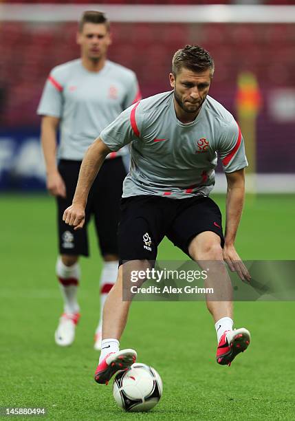Jakub Blaszczykowski controles the ball during a Poland training session ahead of the UEFA EURO 2012 Group A match against Greece at National Stadium...